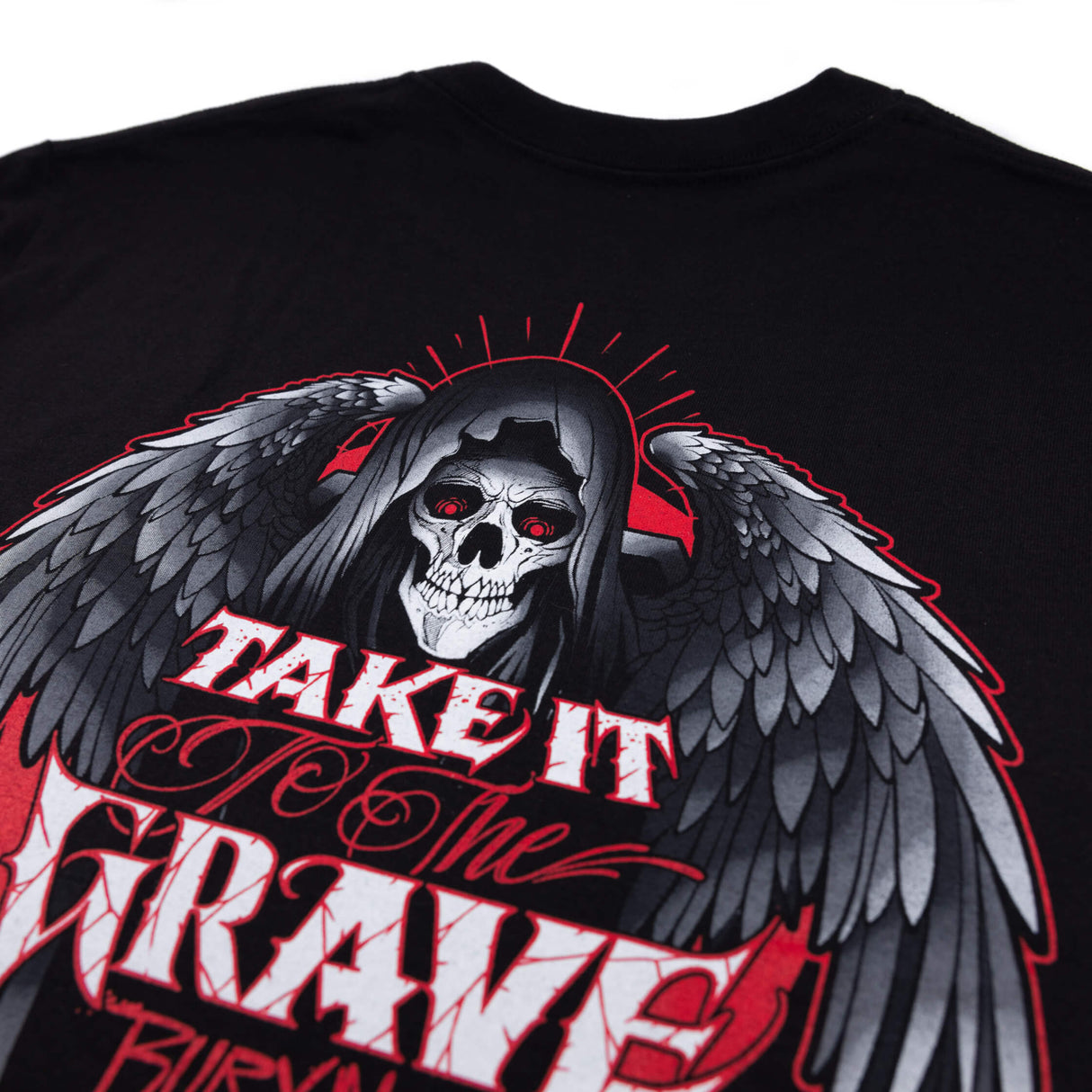 Youth premium black tee close-up of winged skull Take It Grave DBK back artwork