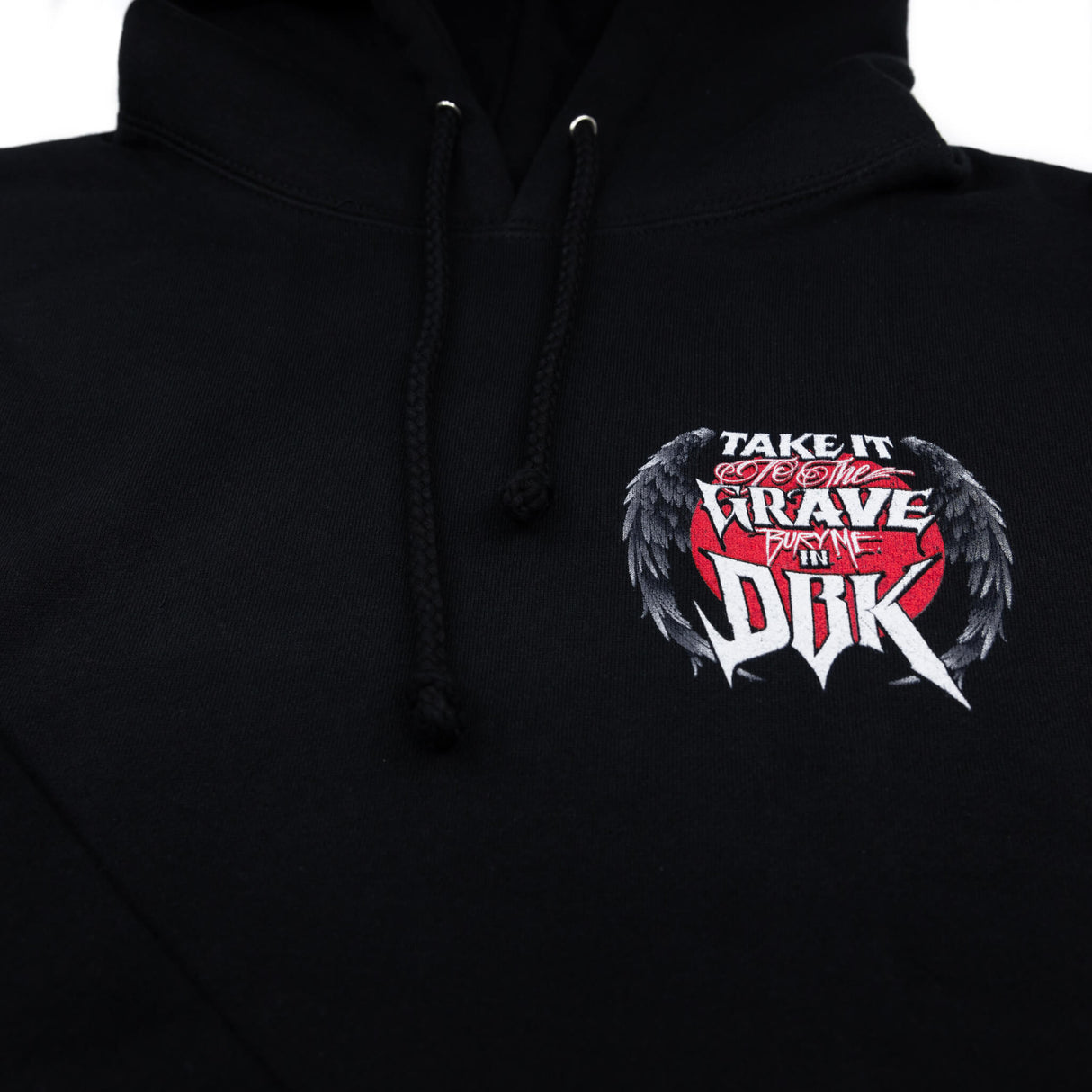 Black hoodie front chest emblem with winged skull and red-and-white lettering