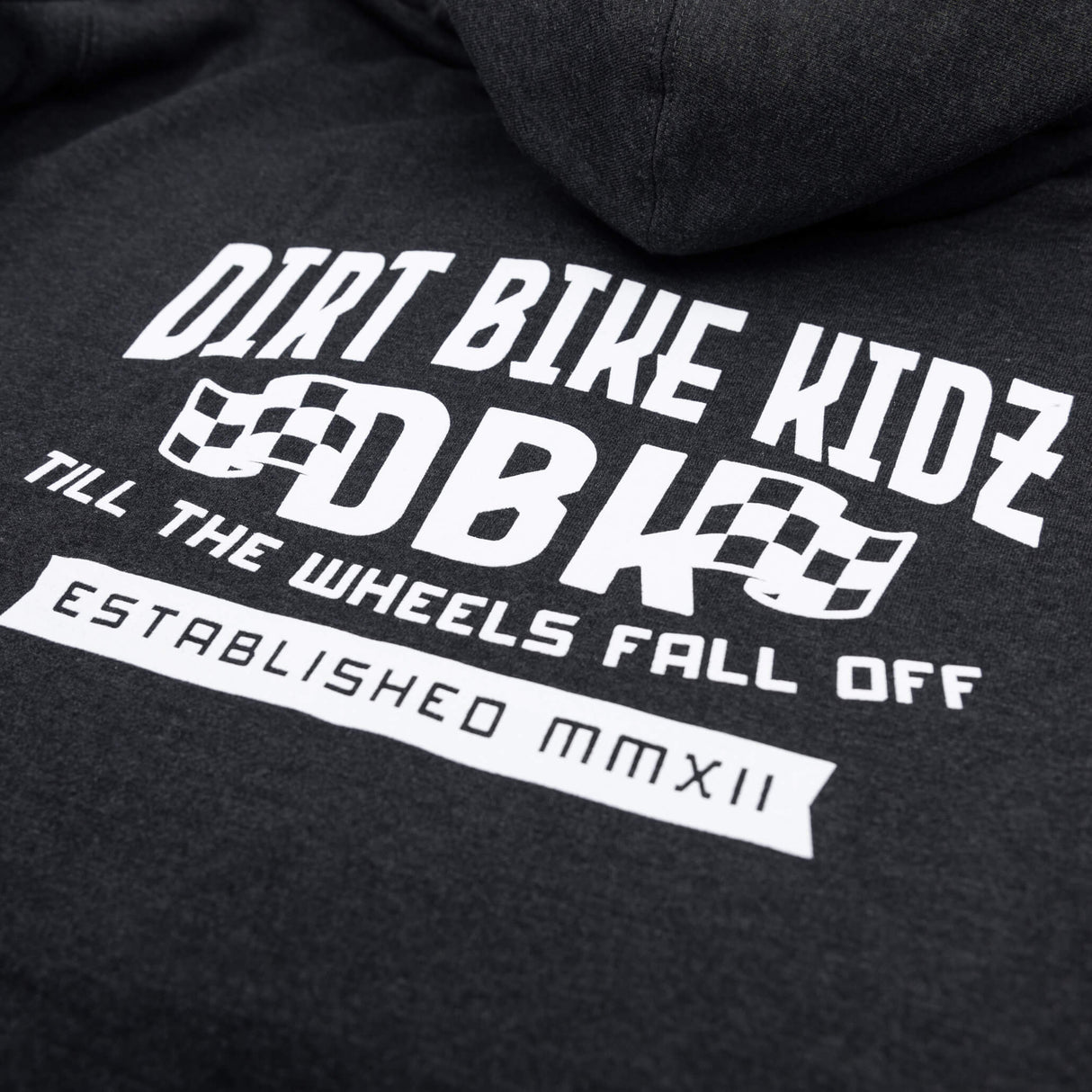 Kids dark hoodie close-up of large back graphic print with checkered logo