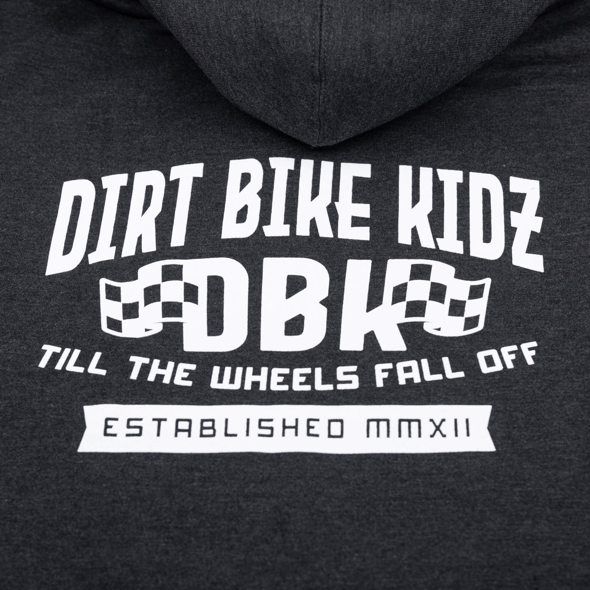 Kids dark hoodie close-up of centered back graphic print on the hooded back