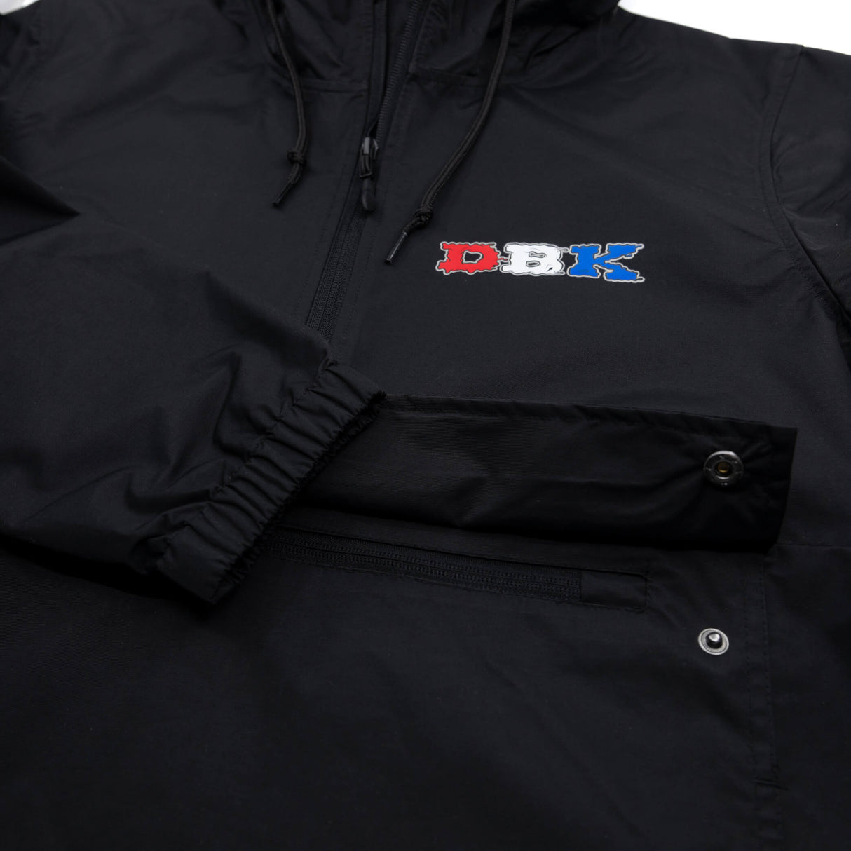 Black windbreaker chest logo patch with drawstring hood and half-zip