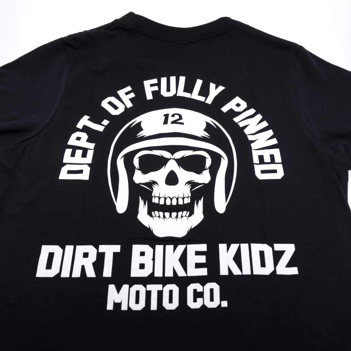 Youth premium black T-shirt back graphic: skull with helmet and arched “DEPT. OF FULLY PINNED”