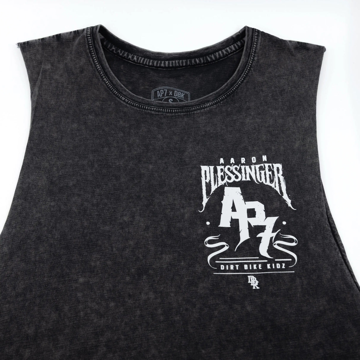 Croc Cowboy AP7 tank top close-up: black sleeveless shirt with Aaron Blessing graphic