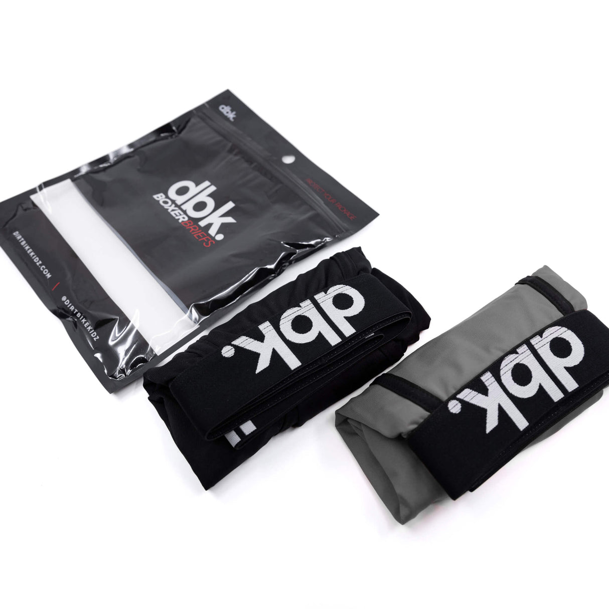 Two-pack boxer briefs in black and gray, packaged in branded plastic sleeves