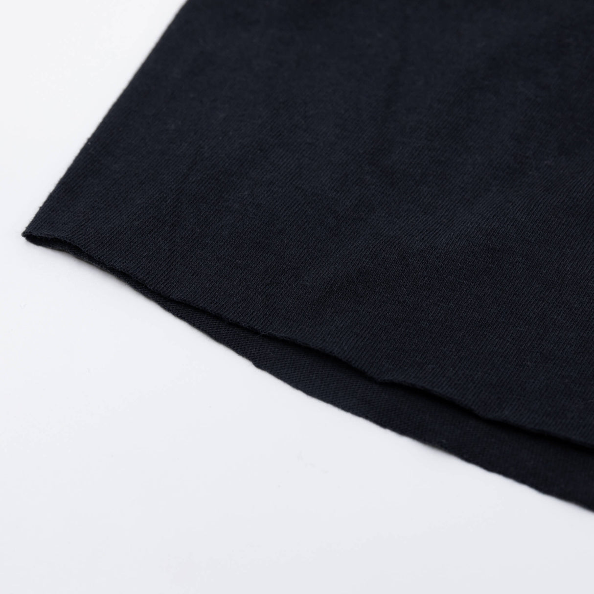 Women's black T-shirt side hem detail in smooth knit fabric