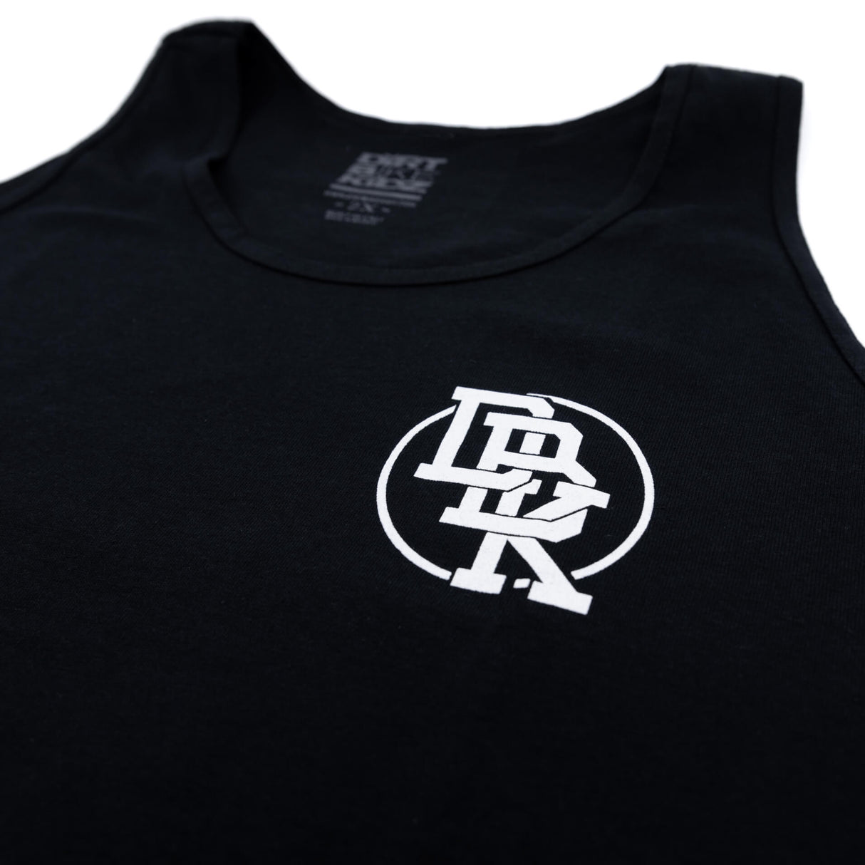 Black youth tank top with small circular 'DBK' emblem centered on chest.