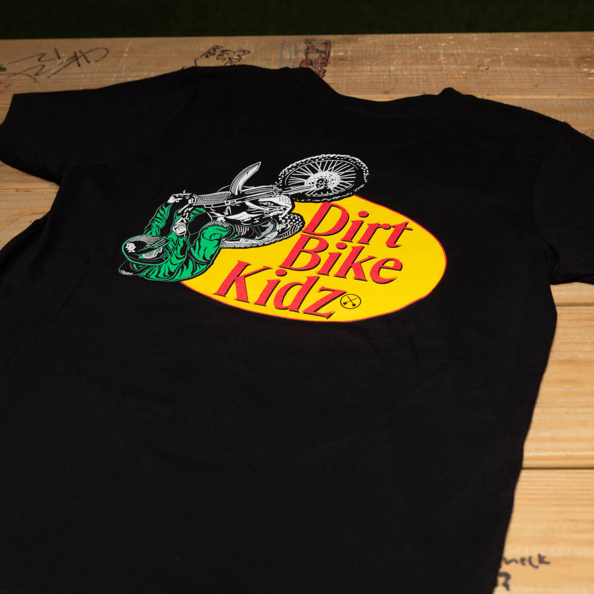 Black youth premium tee with large Dirt Bike Kidz motocross graphic on front