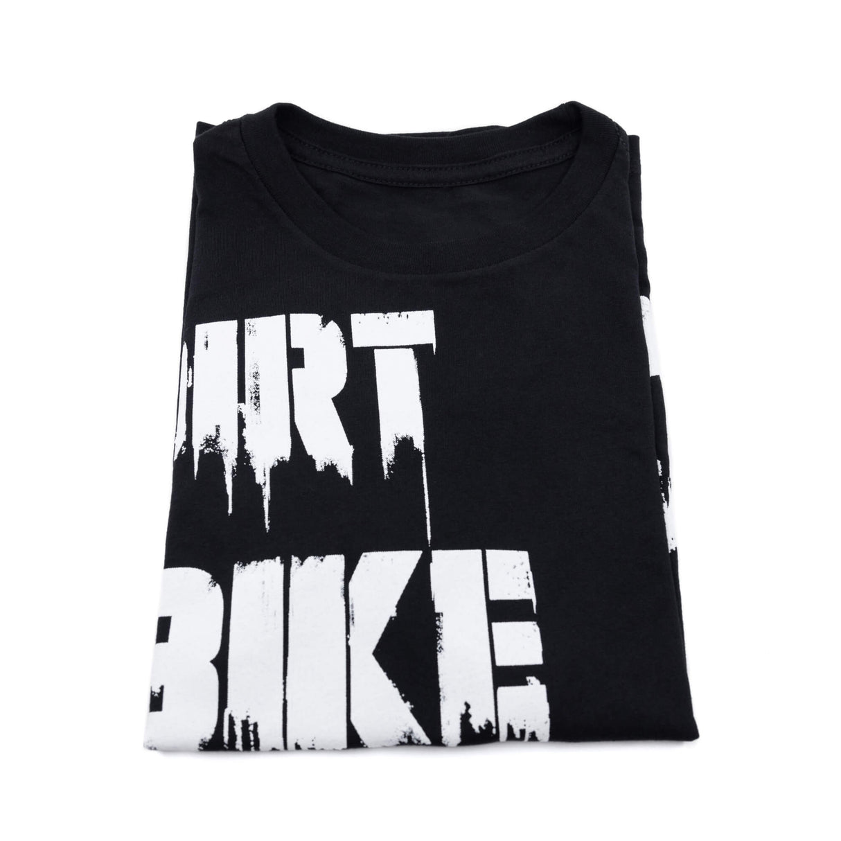 Youth premium tee close-up of chest: black shirt with white distressed "DIRT BIKE" text