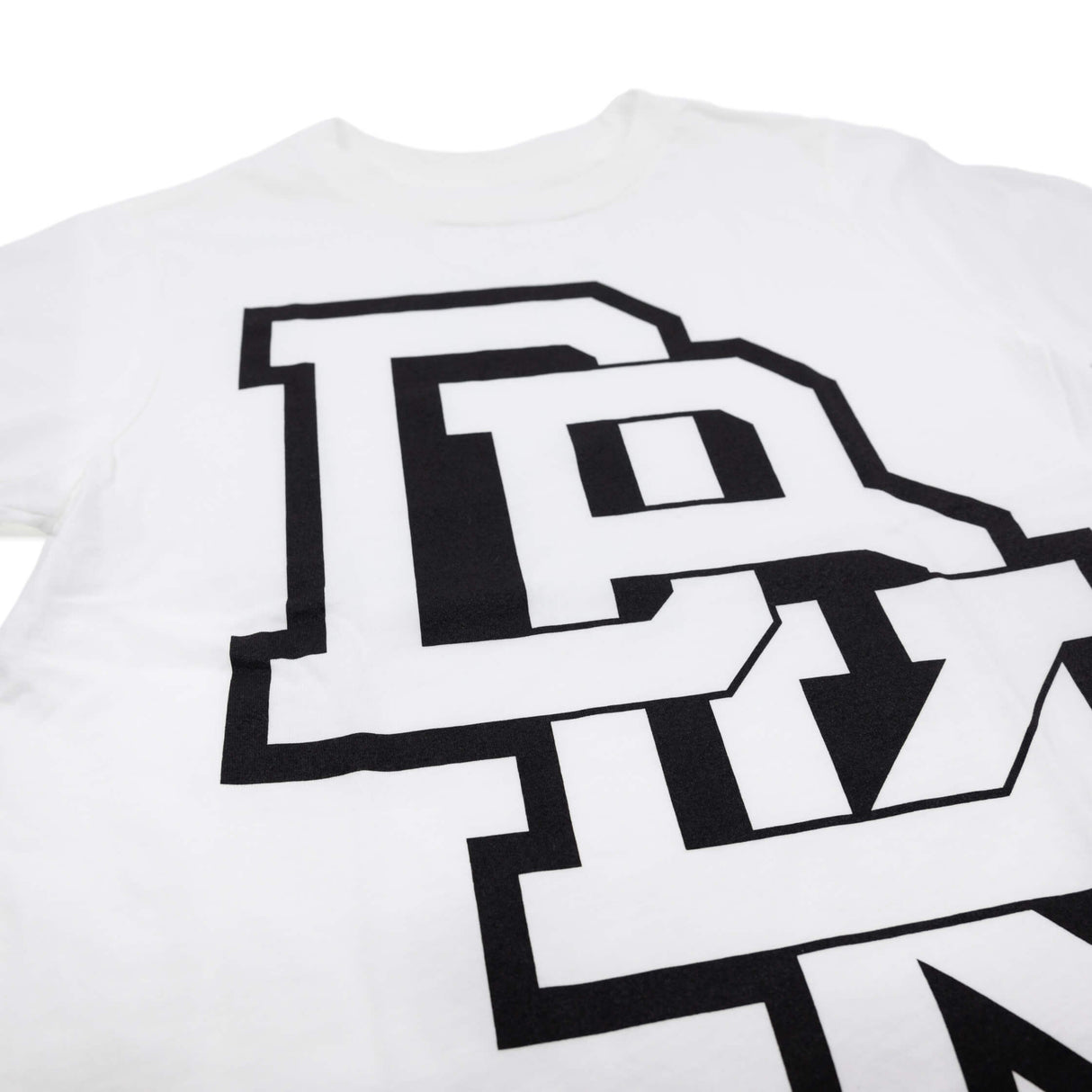 Youth premium T-shirt front detail, white with oversized black stacked letter graphic