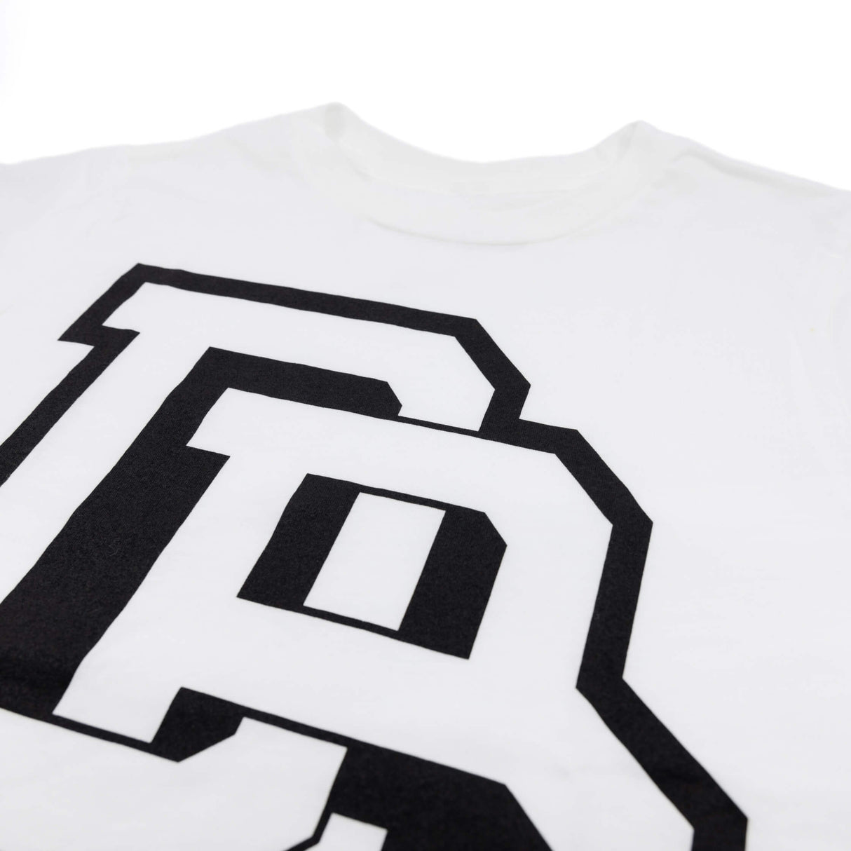 Youth premium T-shirt chest print, white fabric with black stacked letter graphic