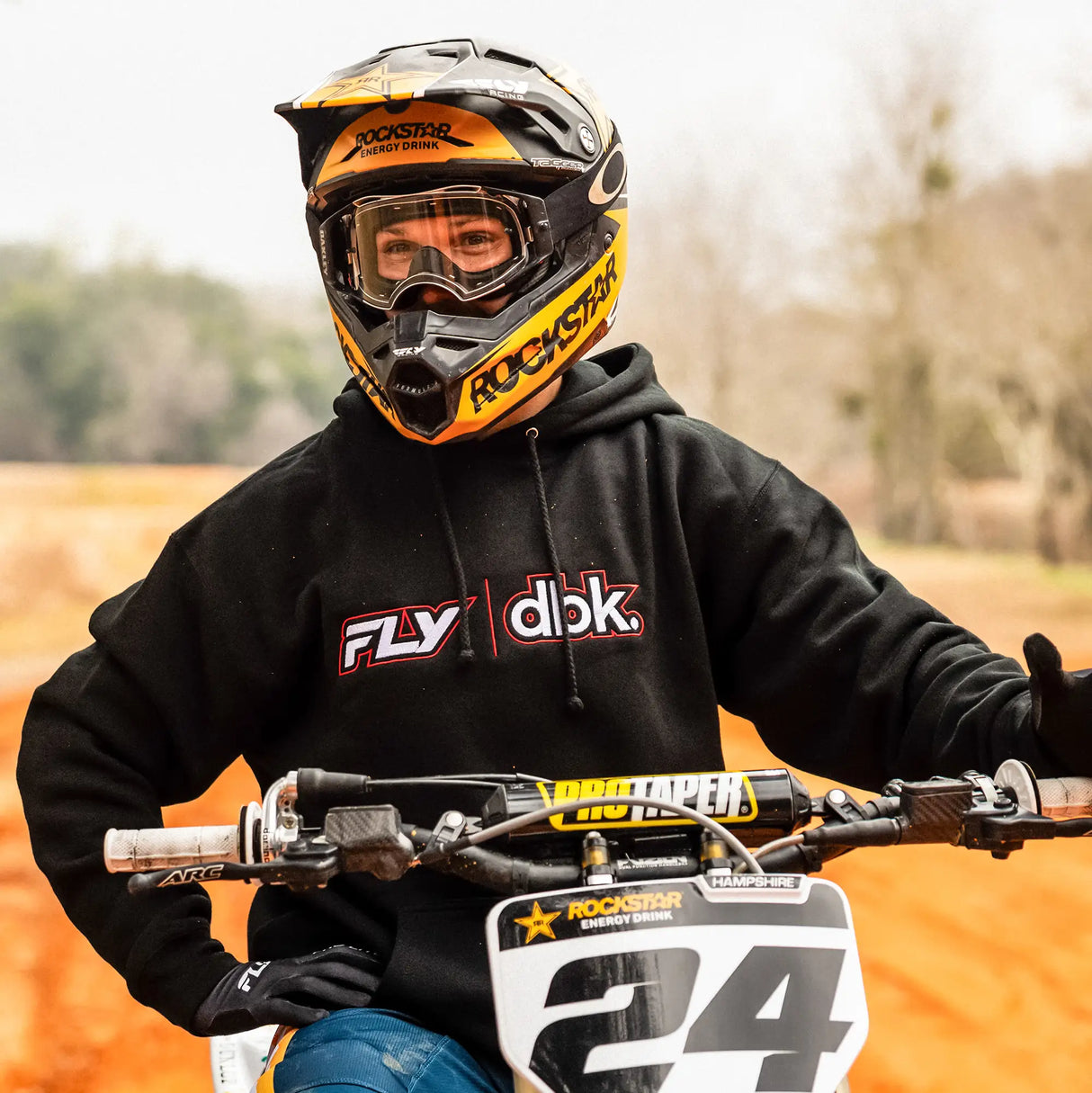 Black hoodie with FLY and dbk logo on chest; drawstring hood and kangaroo pocket