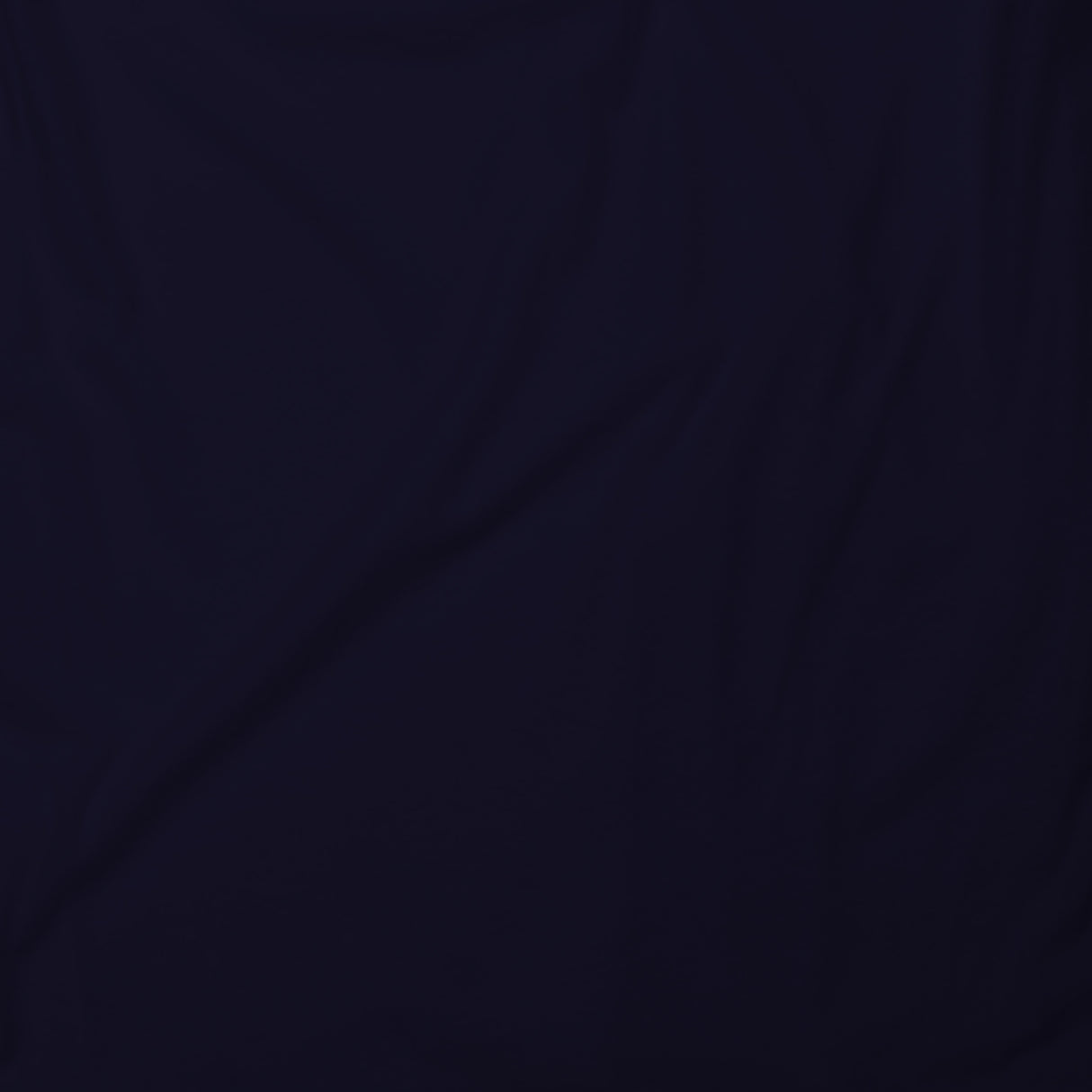 Navy tank top fabric close-up with smooth knit texture.
