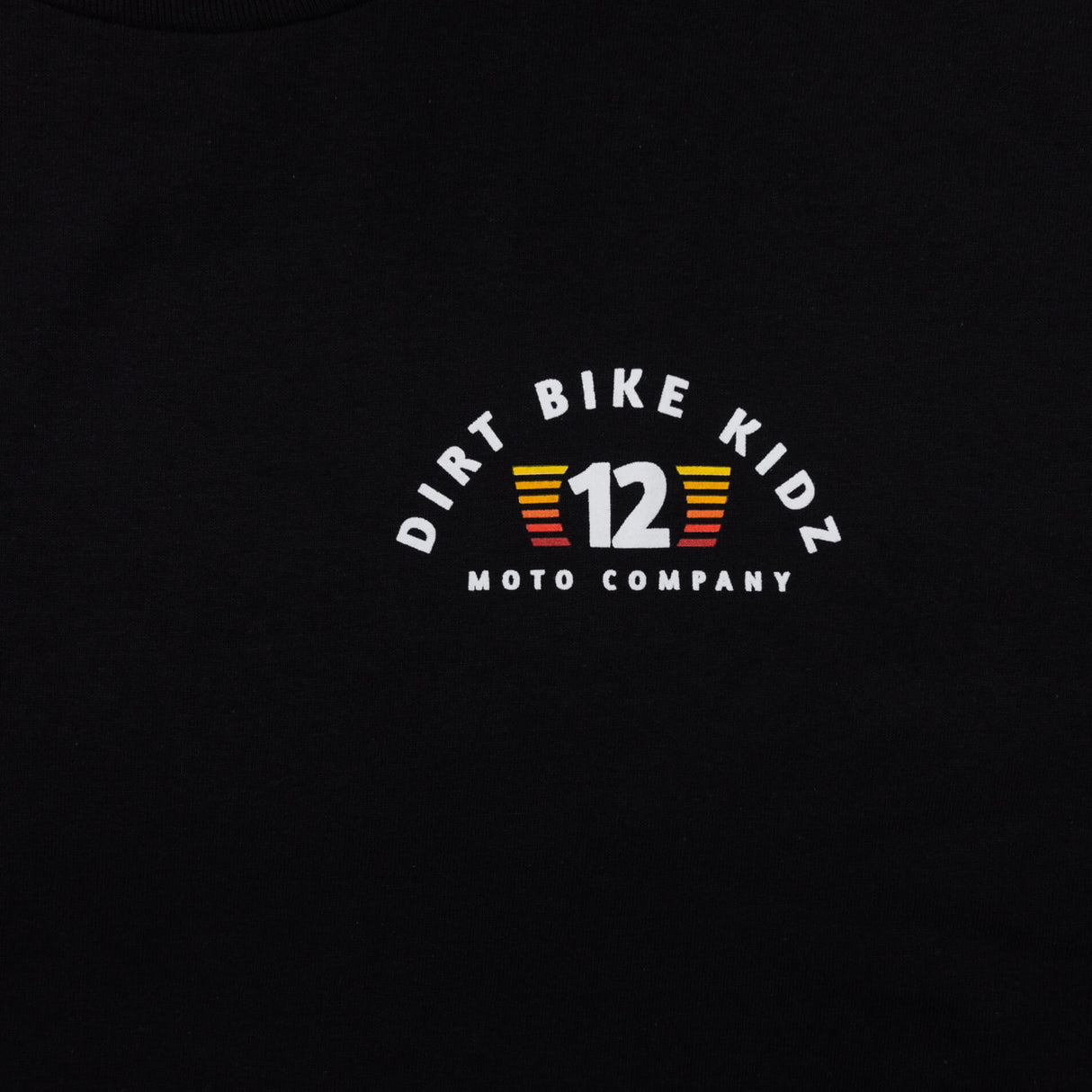 Youth black T-shirt with small Dirt Bike Kidz 12 Moto Company logo at center