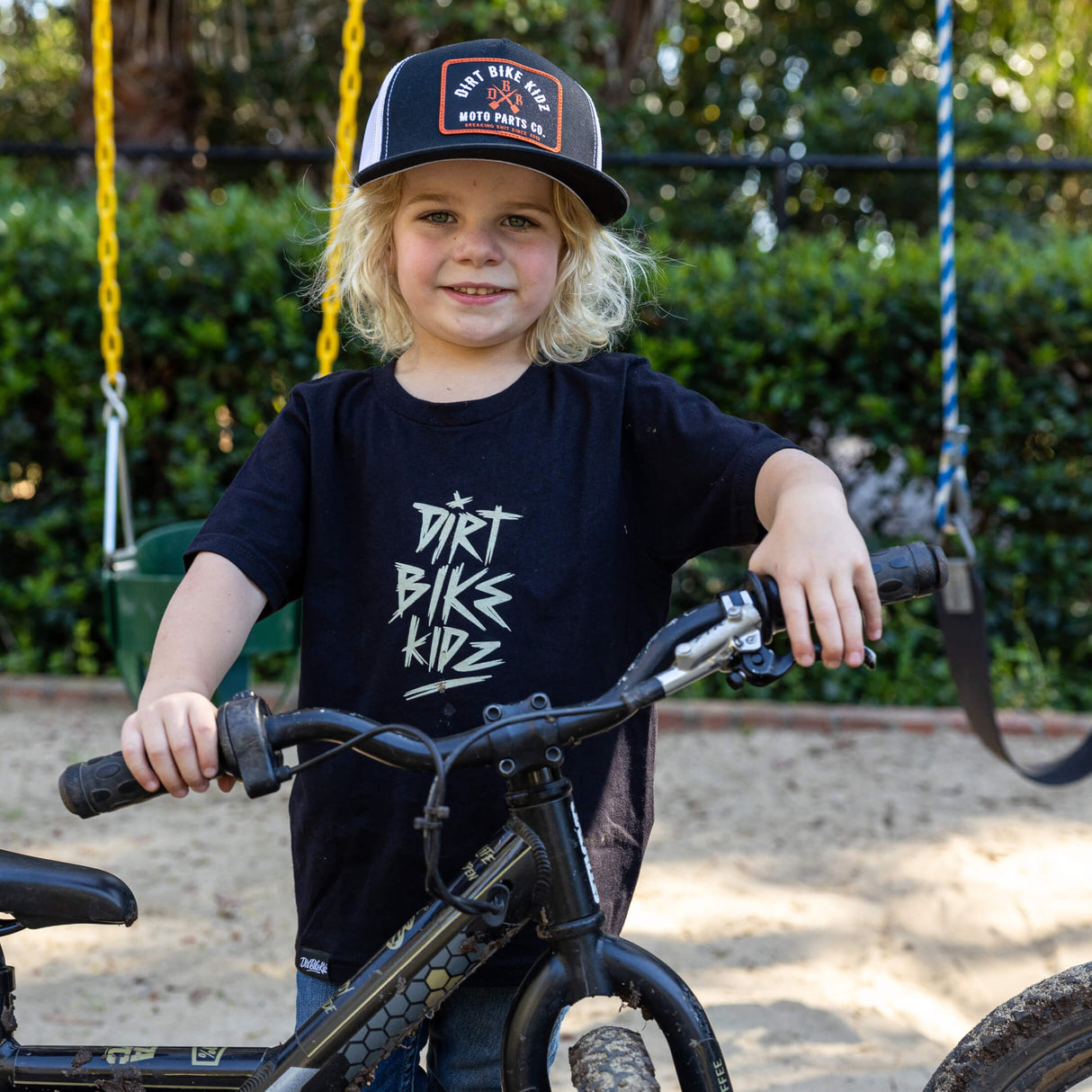 Youth black premium tee with front “Dirt Bikes Kidz” logo