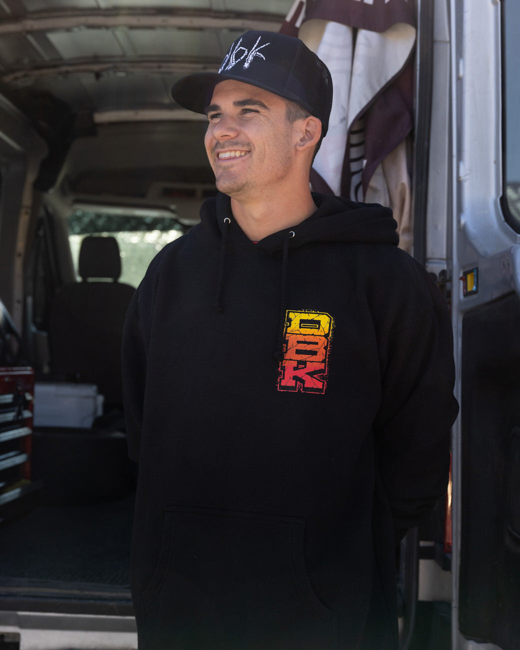 Black Tombstone hoodie front view, small chest logo on left, pullover hood