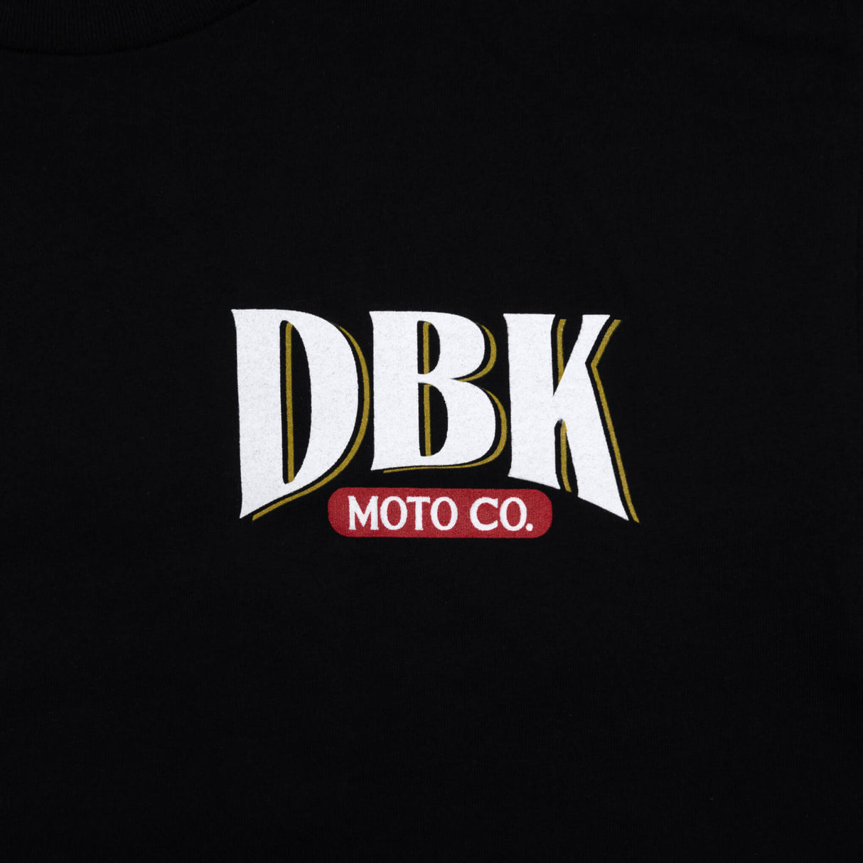 DBK Premium Tall Tee, black, close-up of DBK Moto Co. chest mark