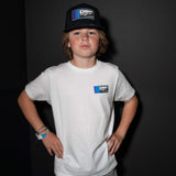 Youth premium tee worn by a child, white with a small DBK logo graphic on the chest