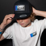 Youth premium tee close-up on chest logo, white with DBK logo patch