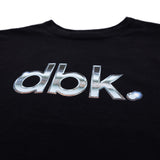 Black T-shirt close-up of metallic silver dbk logo graphic across front.