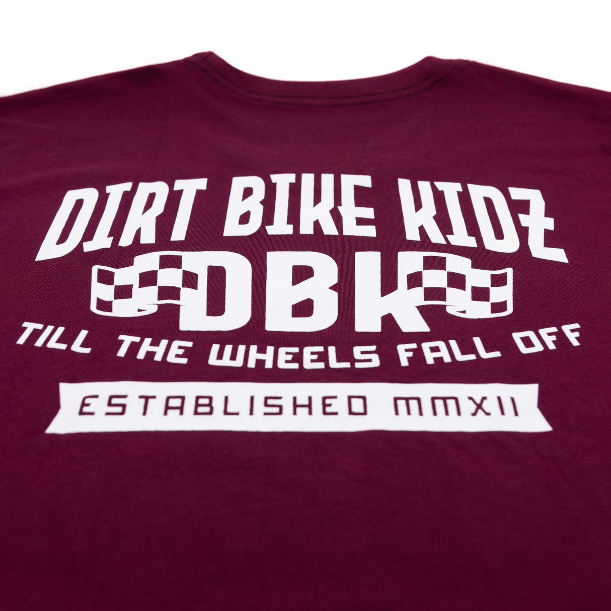 Burgundy T-shirt close-up of large back DBK print with “Till the Wheels Fall Off”