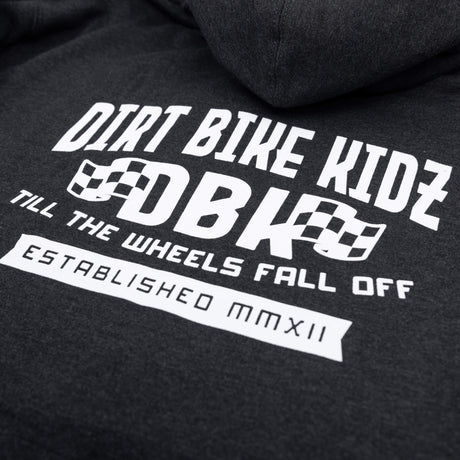 Kids dark hoodie close-up of large back graphic print with checkered logo