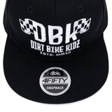 Black snapback cap with circular dbk 4FIFTY SNAPBACK patch on the back