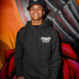 Kids dark pullover hoodie with hood and front pocket, small chest logo graphic