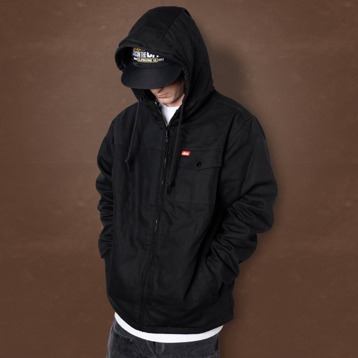 Deluxe jacket, dark hooded zip-up with chest pocket and hood drawstring cords