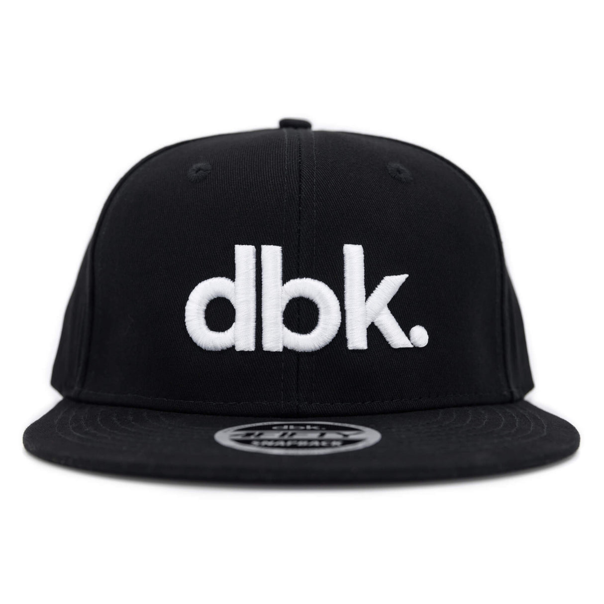 Black snapback cap front view with large white dbk logo and flat brim.