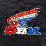 DBK logo graphic on black windbreaker fabric with red, white, and blue print