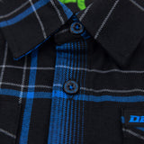Youth flannel shirt close-up: black and blue plaid, button-down collar, blue buttons