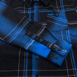 Youth flannel shirt cuff and sleeve placket in blue-and-black plaid with buttons