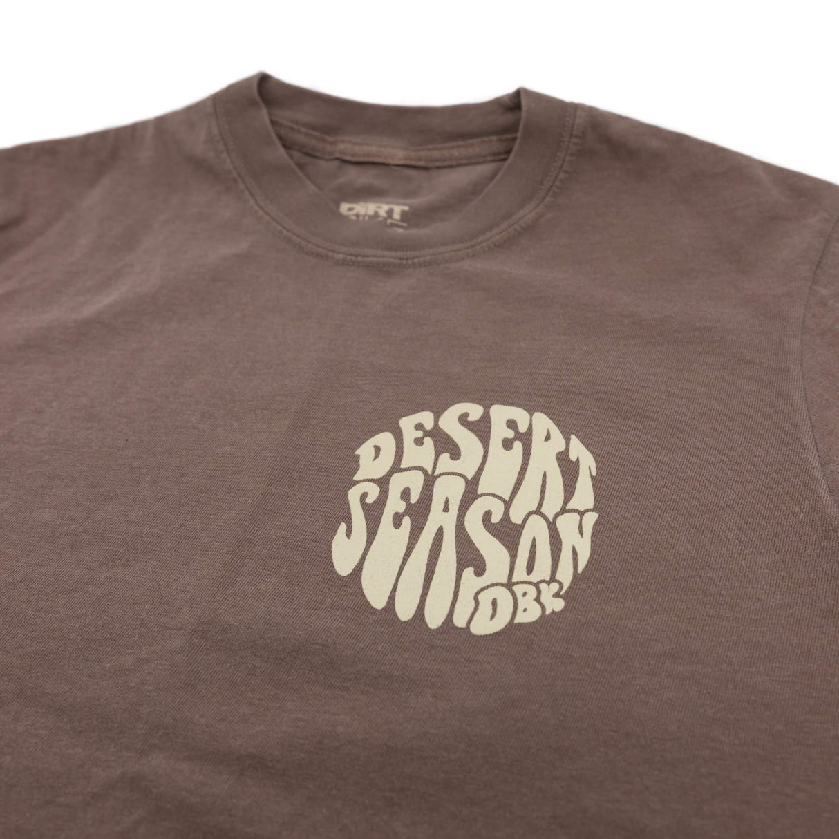 Brown womens crew-neck T-shirt with Desert Season logo printed at center chest