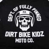 Black kids graphic tee close-up of large back skull helmet logo and “Dirt Bike Kidz.”