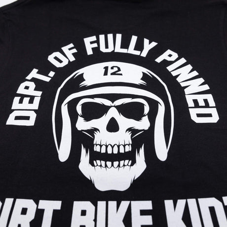 Black kids graphic tee close-up of back skull helmet emblem filling the chest area.