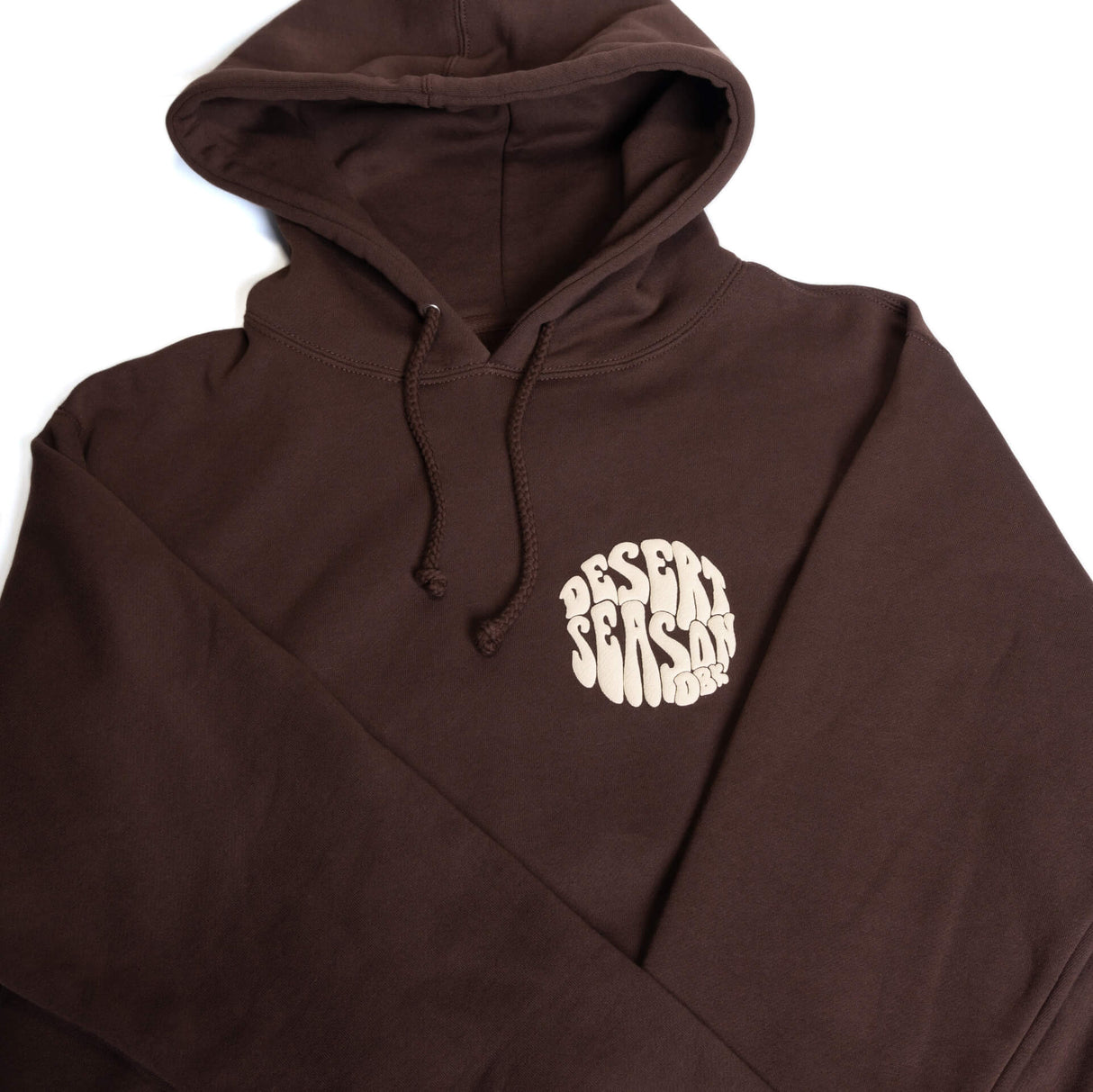 Dark brown pullover hoodie with attached hood, drawstrings, and small chest logo