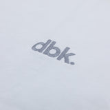 White crew T-shirt with gray dbk logo close-up