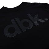 Youth premium tee, black with dbk. logo print on chest (close-up)
