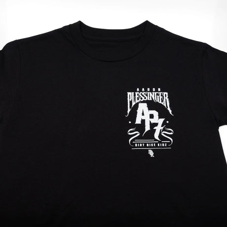 Black T-shirt with white Pleasinger AP7 Dirt Bike Kid logo