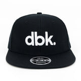 Youth snapback cap in black with centered white dbk wordmark and 4FIFTY YOUTH badge