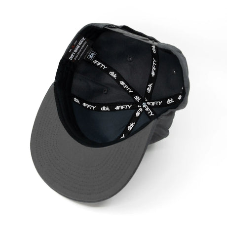 Inside view of charcoal snapback cap with patterned 4FIFTY and dbk lining