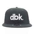 Charcoal snapback cap with large white dbk logo centered on the front