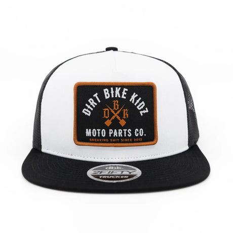 MP Trucker cap front: white crown, black brim, black logo patch with orange outline