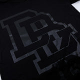 Youth premium tee, close-up of large front letter-style logo on black