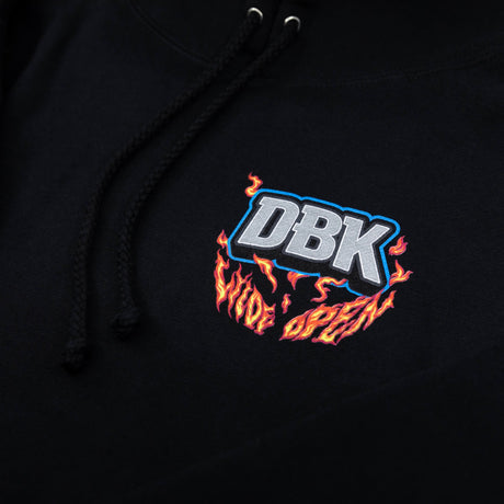 Front pocket and hood of a black Wide Open Hoodie with small DBK flame logo