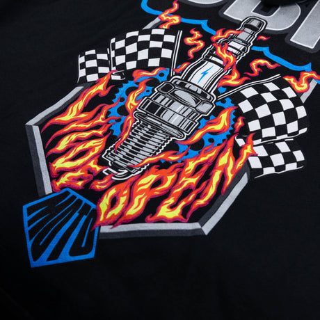 Close-up graphic on black hoodie: flaming engine with checkered pattern