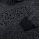 Women’s dark charcoal pullover hoodie close-up of front logo embroidery and fabric texture