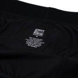 Black boxer briefs care label with sizing and fabric instructions
