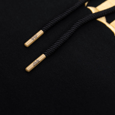 Monte Carlo hoodie cuff with small embroidered logo on black fabric