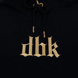 Black hoodie with large gold logo on chest and black drawstring hood cords.